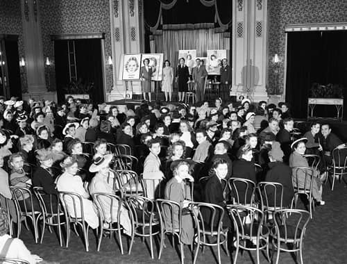 1941 Demonstration of seven face types.