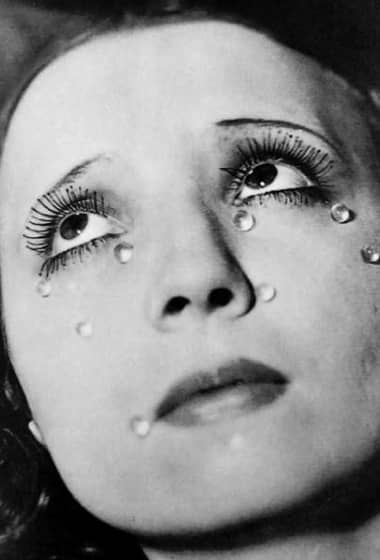 Man Ray photo of eyelash beading