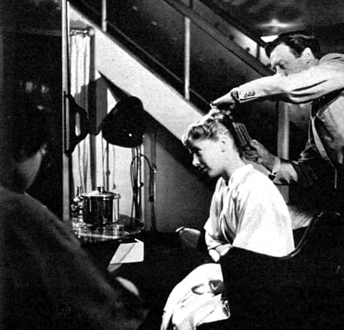 1952 Hair stylist at work in the London salon