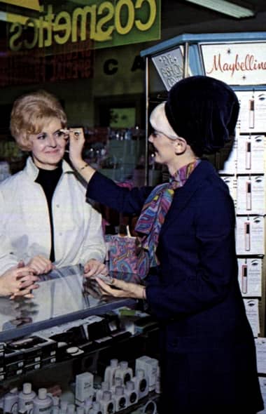 1969 Customer trying on Maybelline