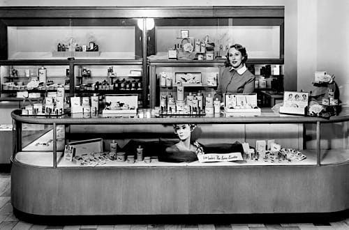 1951 Estee Lauder behind the counter at Neiman Marcus