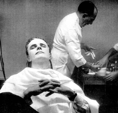 1954 Facial treatment in the Gourielli Barber Shop